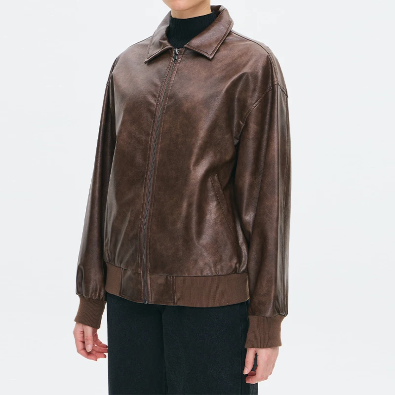 سترة جلدية PU أنيقة متعددة الاستخدامات مع طية صدر السترة وسحاب ريترو فضفاض معطف قصير كاجوال أنيق موضة الخريف ملابس خارجية نسائية ملابس الشارع