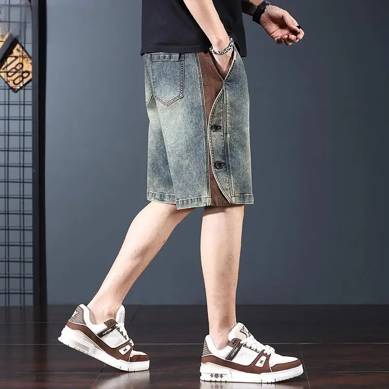 กางเกงขาสั้นผ้ายีนส์เฮฟวี่เวทอินเทรนด์ของผู้ชายสําหรับฤดูร้อนกางเกงห้าจุดประกบอเมริกันหลวม