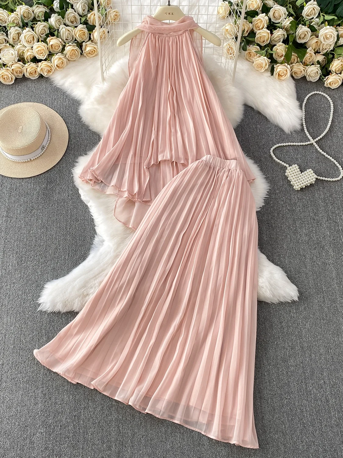 

Комплект Vaion Sle Spicy Girl: топ-жилет с асимметричным дизайном и плиссированная юбка макси с высокой талией для стройнящего эффекта