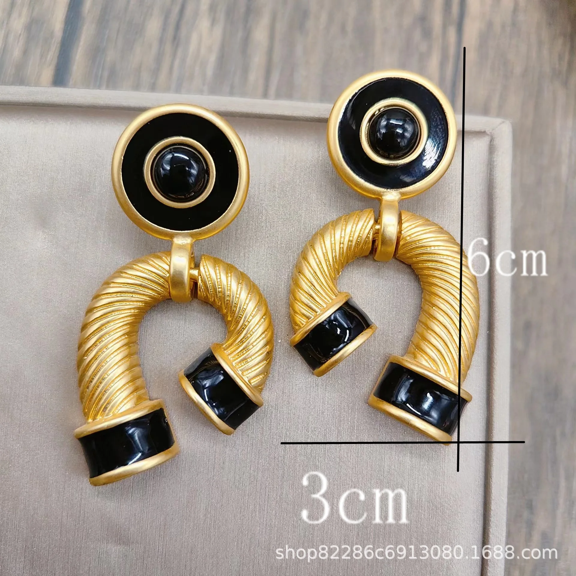 Electroplated gold retro, exaggerated design earrings