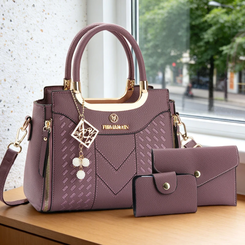 3-piece handbag set made of lychee-grain PU leather. This solid-color women's crossbody bag features a premium texture view 6