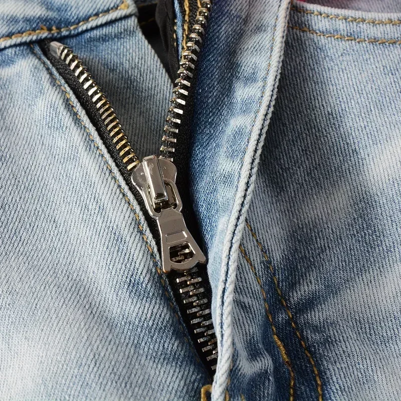 Modne męskie jeansy High Street z aplikacjami, ręcznie szlifowane, podarte, dopasowane i wyszczuplające, modne markowe jeansy do kostki.