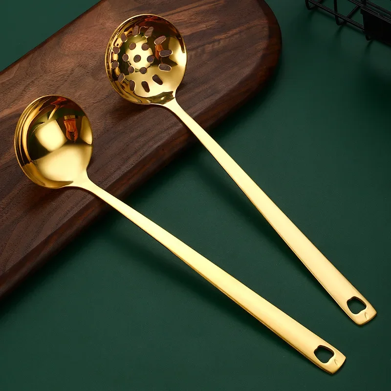

Spoon colander stainless steel long handle household thickened golden hot pot spoon golden deepened soup shell colander.