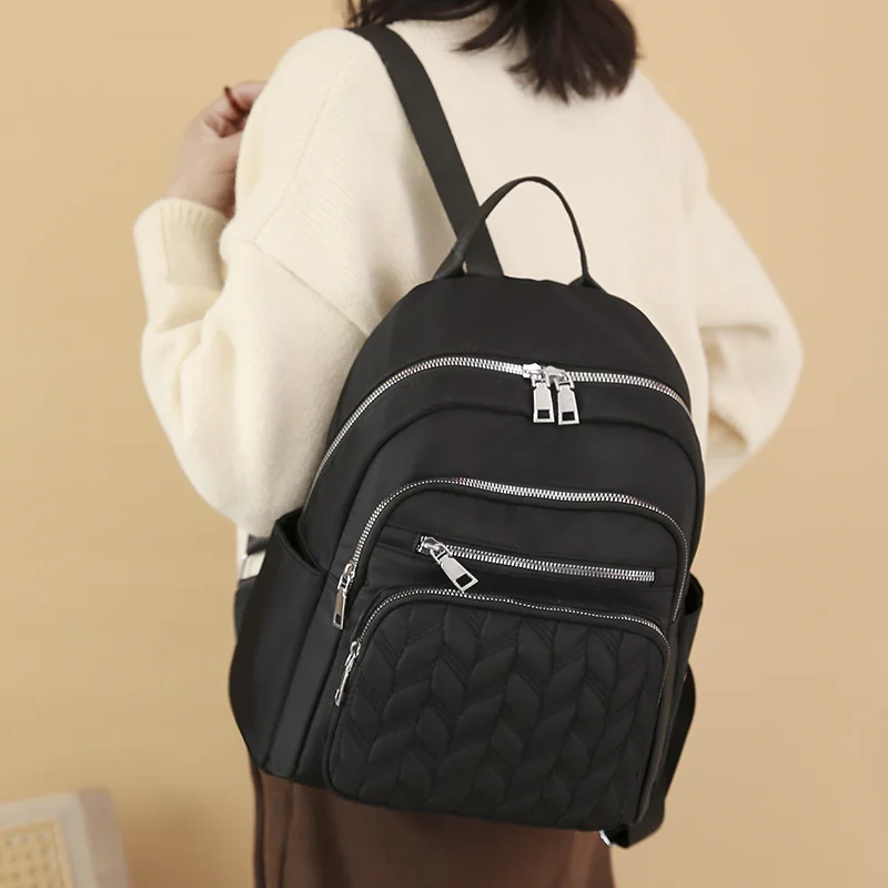 Mochila casual elegante, versátil para passeios diários, pode ser transportada em um ombro, com vários bolsos e grande capacidade