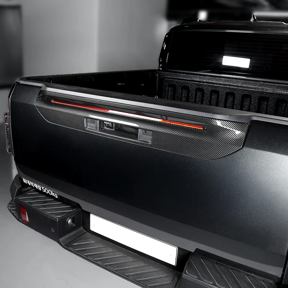 

For Kia TASMAN 2025 2026 Car External Black Carbon Fiber Style ABS Rear Brake Lampshade Cover Trim Accessories LHD/RHD