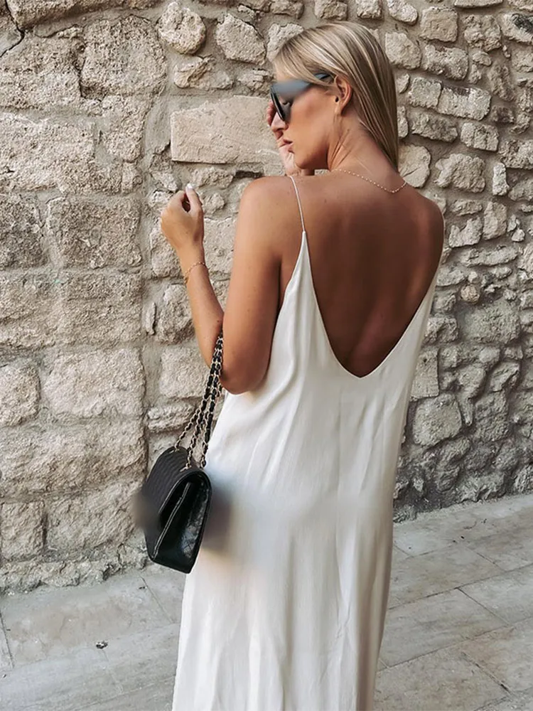 Abito lungo da donna elegante con spacco bianco da donna Sexy senza schienale senza maniche abiti estivi 2024 abiti da vacanza al mare femminili