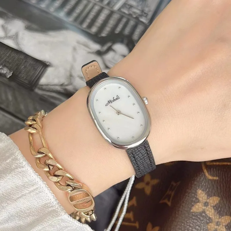 

New high-quality luxury waterproof oval fashion medieval women's atmosphere simple belt elegant women's quartz watch