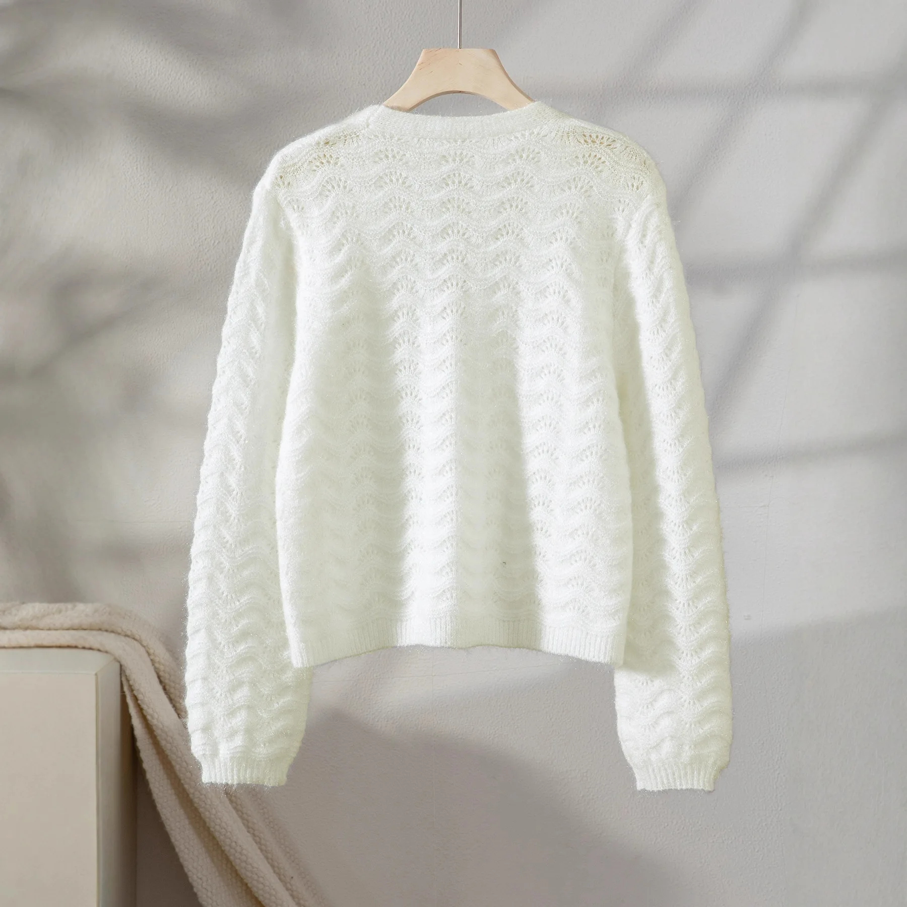 Maglione lavorato a maglia con scollo a V a maniche lunghe scavato sexy Design a vita ampia Nuovo stile Moda femminile Stile europeo e americano