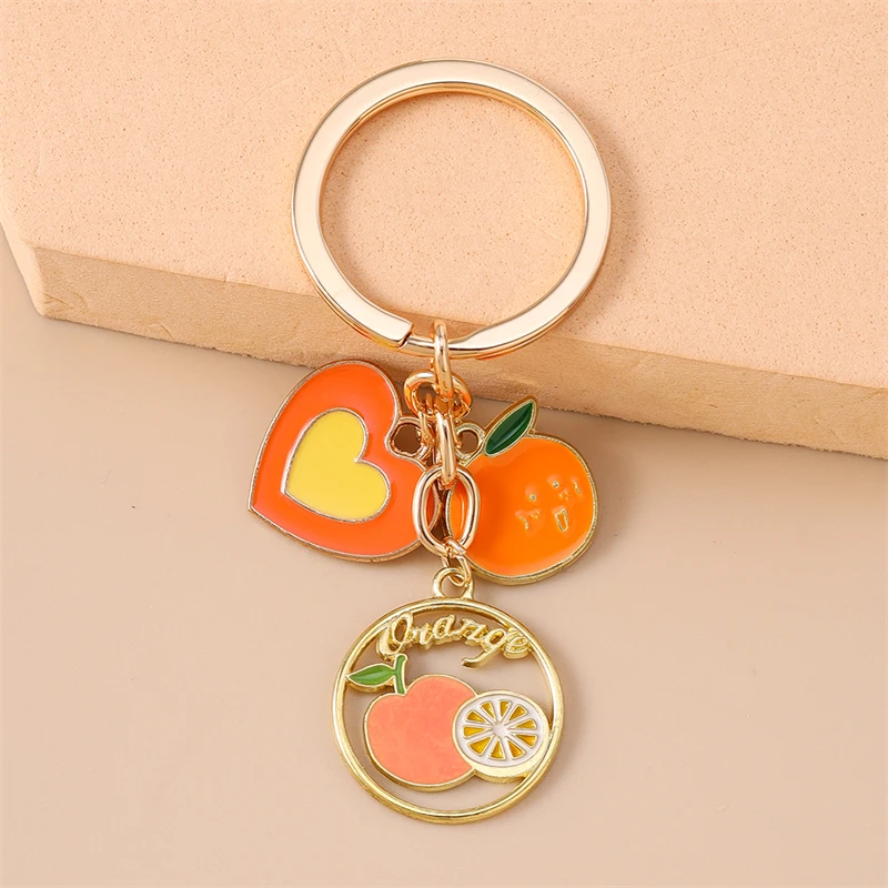Niedliche Frucht-Schlüsselanhänger: Emaille-Apfel, Erdbeere, Wassermelone, Herz-Anhänger für Frauen und Männer, Auto-Schlüssel, Handtaschen-Schlüsselketten, DIY-Geschenk – Detail 8