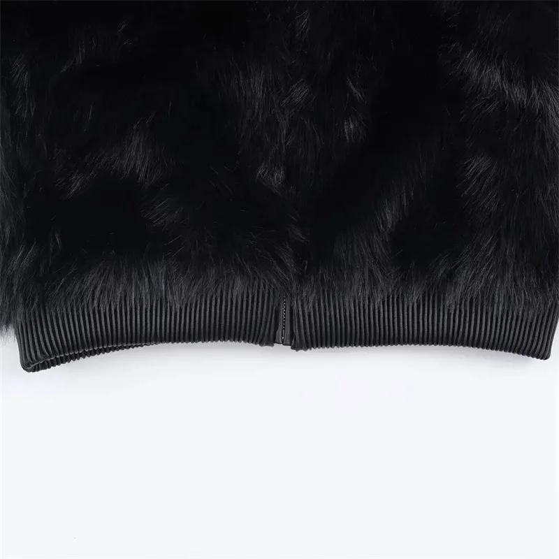 เสื้อโค้ทผู้หญิง ฤดูหนาว 2025 รุ่นใหม่ สีดำ แขนยาว ลายขนสัตว์เทียม ซิป คอตั้ง อุ่น แฟชั่นระดับไฮเอนด์ ทันสมัย