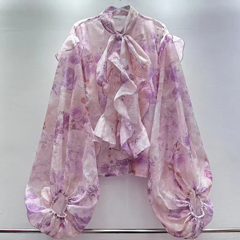 Blouse de printemps de style européen pour femmes, nouveau style français 2026, charmante dentelle à nœud papillon, manches lanternes, blouse à ourlet volanté