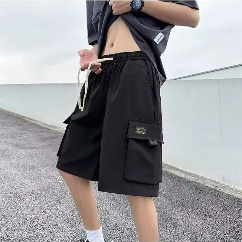 ยาว Baggy พร้อมกระเป๋าเอวยางยืดหลวม Draw String กางเกงขาสั้นสําหรับชายเบอร์มิวดา Half Oversize Mens Cargo กางเกงขาสั้นกว้าง