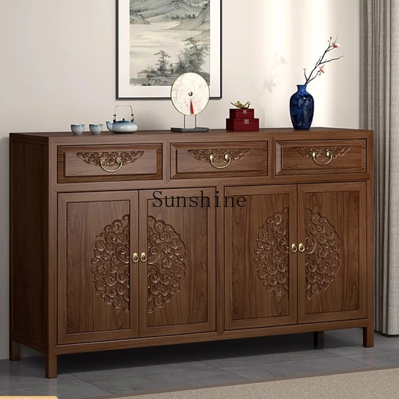 

solid wood locker is facing the door entrance, living room Japanese style integrated against the wall and dining side