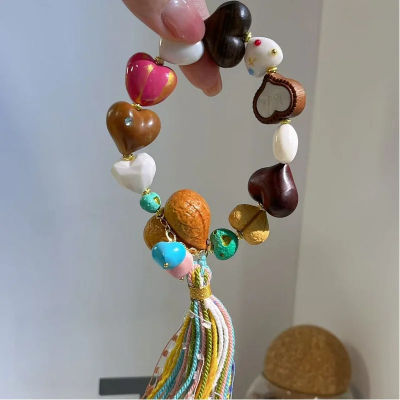 

Duobao Heart Handheld Bone Bead Bracelet