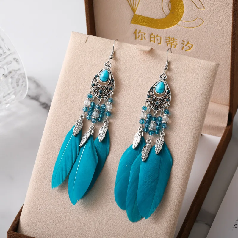 2026 الخاص بك Tixi البيضاوي مزاجه ريشة أقراط العرقية نمط كريستال أقراط Yunguichuan السفر المجوهرات بالجملة