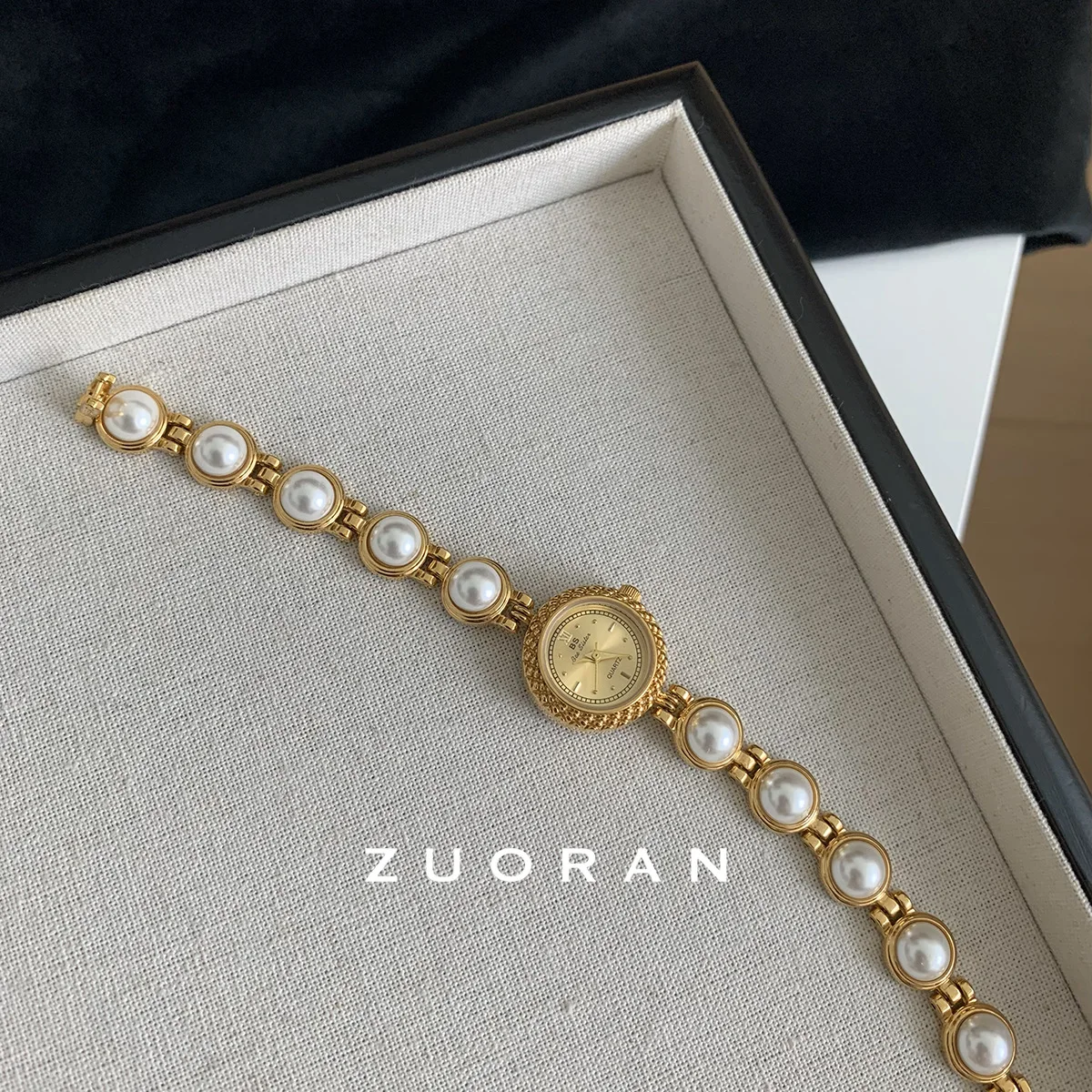 

Women'swristwatchelegant Frenchstyle round dial withpearldesignexquisite and fashionable quartz watchwomen's designer wristwatch