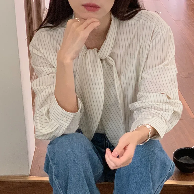 

Элегантная весенняя рубашка в полоску для женщин, свободного кроя, с длинным рукавом, на одной пуговице, с завязками, в корейском стиле, повседневная мода
