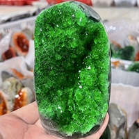 One realistic green crystal stone cluster - solid crystal structure, polished edges, deep green interior, durable stone finish