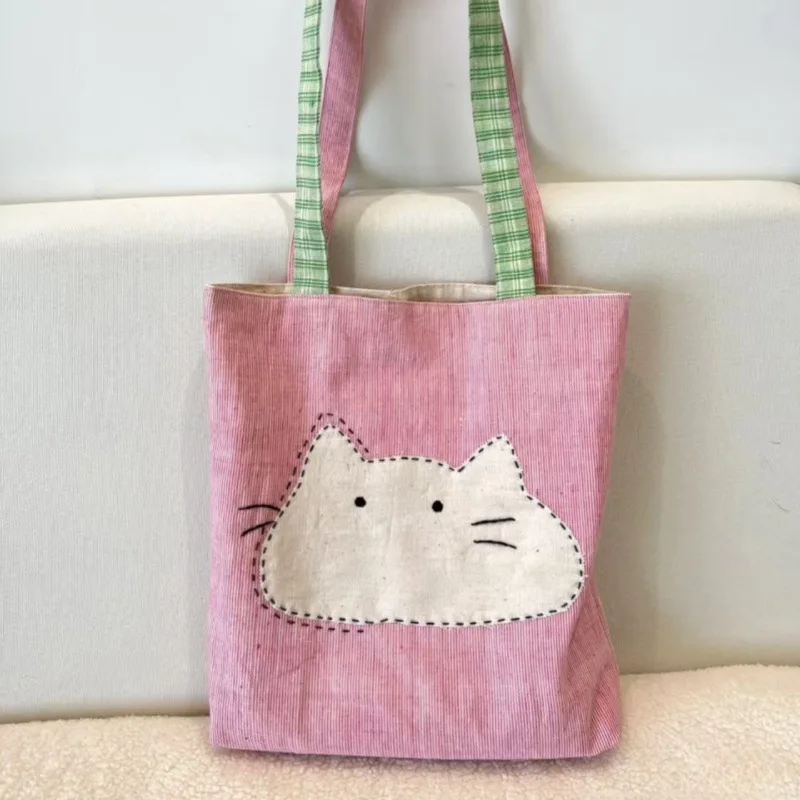 2025 New Japanese Shoulder Bag Versatile Simple Canvas Women's Bag Cute Cartoon Cat Literary Commuter Bag