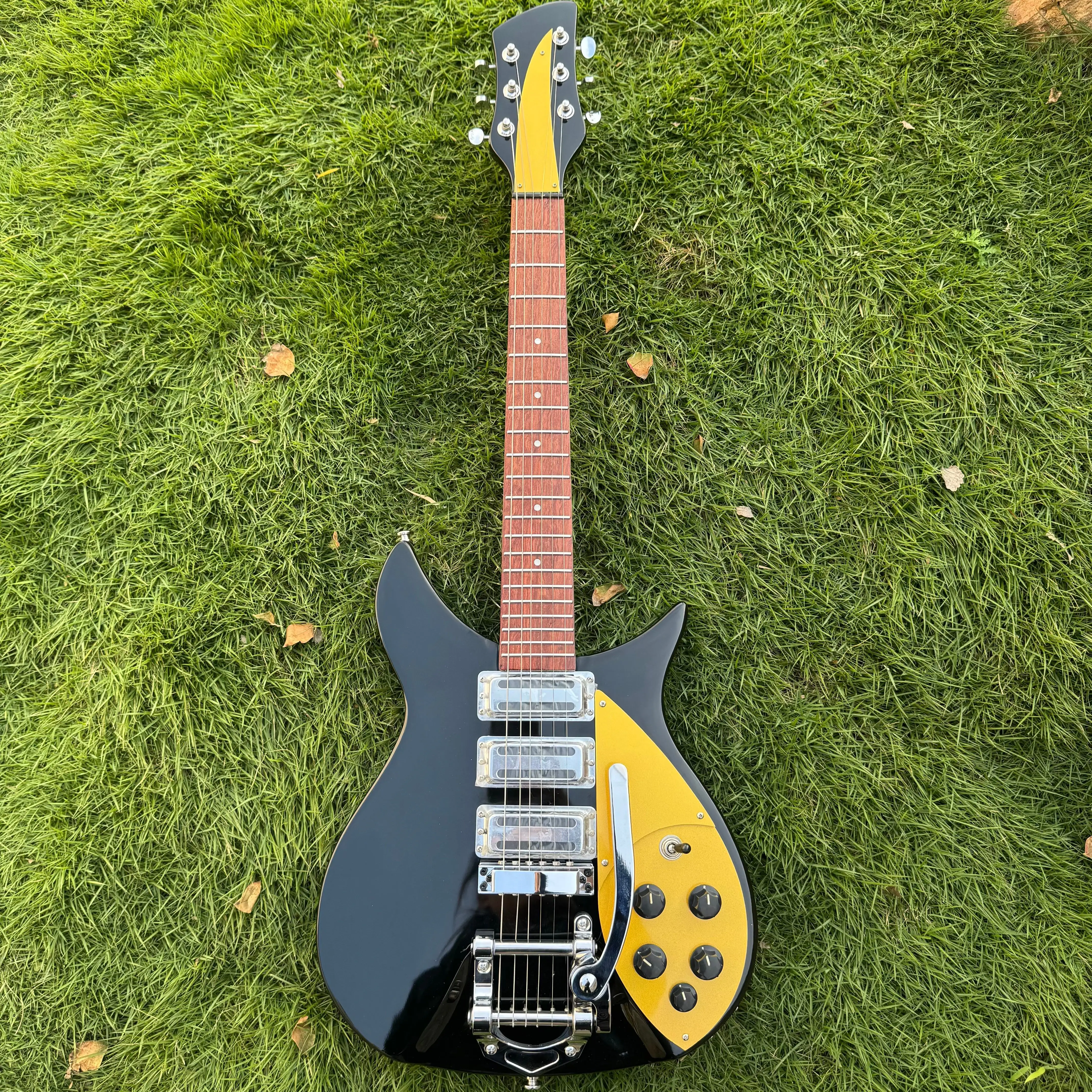 

34-дюймовая электрогитара с корпусом из красного дерева, грифом из палисандра, кленовым грифом и 21 ладом