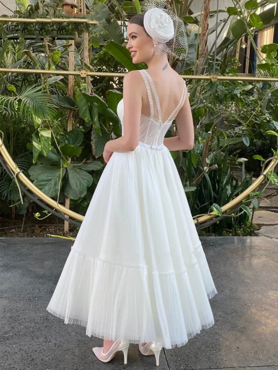 เซ็กซี่ชุดแต่งงานสั้นชาความยาวชุดเจ้าสาว Soft Tulle สปาเก็ตตี้สายรัดคริสตัล Robe De Mariée สําหรับ Elegant