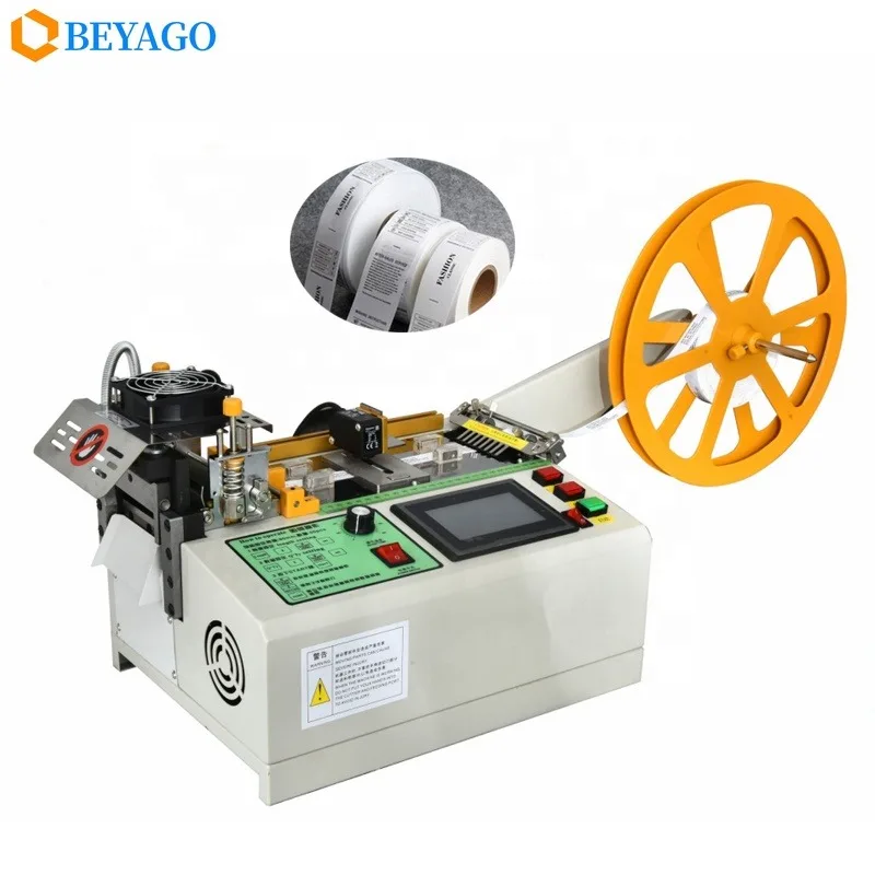 [Le più vendute] Tagliatrice automatica a caldo freddo del nastro dell'etichetta del nastro del tessuto del miglior prezzo