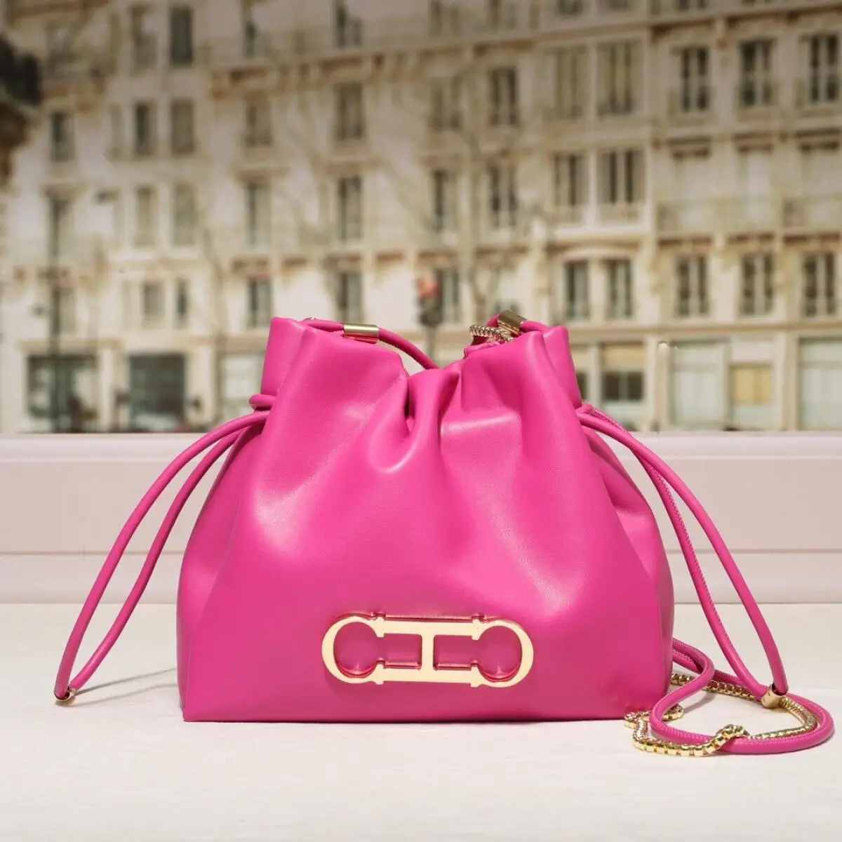

Fashionable and Trendy Letter Drawstring Bucket Bag for Commuting and Leisure One Shoulder Light Luxury True Texture Women's Bag