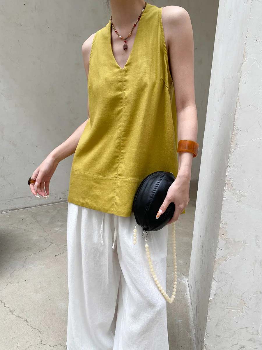 Sommerliche Damen-Weste in unifarbenem Design mit V-Ausschnitt und lockerem Schnitt ohne Ärmel. – Detail 34