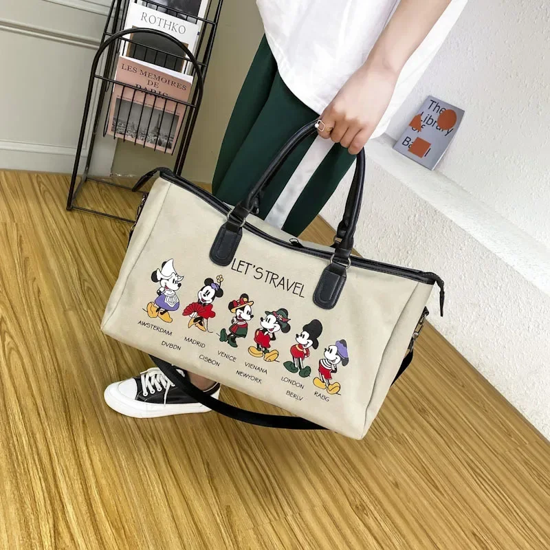 Disney-bolsa de viaje con estampado de dibujos animados para mujer, equipaje de viaje corto con estampado de Mickey, almacenamiento de artículos de