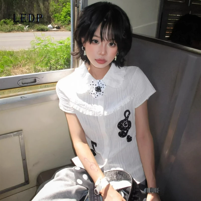 

Женская рубашка в корейском стиле с вышивкой музыкальных нот, белая, с воротником-стойкой, короткий рукав, летняя новинка, приталенная, тонкая, для женщин