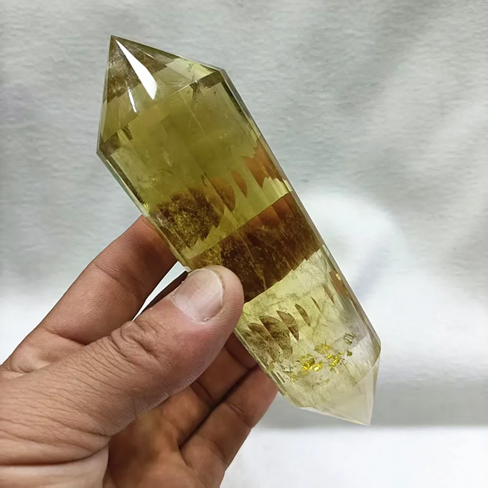 The 341g natural yellow crystal Rainbow Meditation Obelisk is inspired by Vogel, featuring 24 clear quartz faces and spiritual j