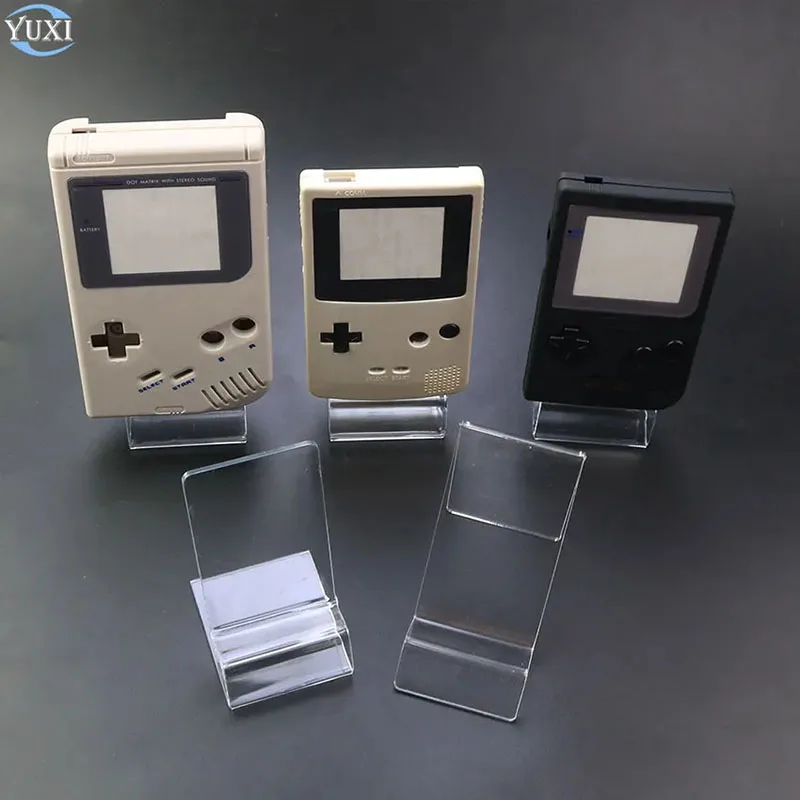 1PC 透明なクリアプラスチックスタンド棚ウィンドウカウンターディスプレイショーケース GB GBA SP GBC 3DS 2DS PSP PSV コンソール