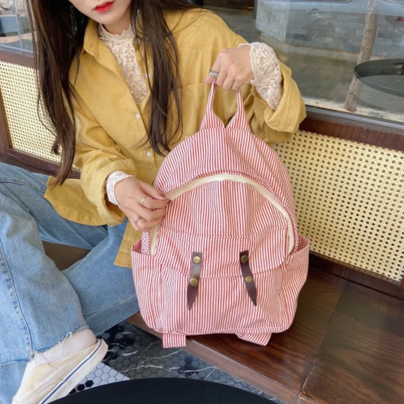 กระเป๋าเป้สะพายหลังนักเรียนมัธยมความจุขนาดใหญ่ แฟชั่นสำหรับวัยรุ่น กระเป๋าเป้สะพายหลังสำหรับผู้หญิงใส่แล็ปท็อป กระเป๋าไปโรงเรียน กระเป๋าเป้สะพายหลังผ้าแคนวาสสำหรับนักศึกษา