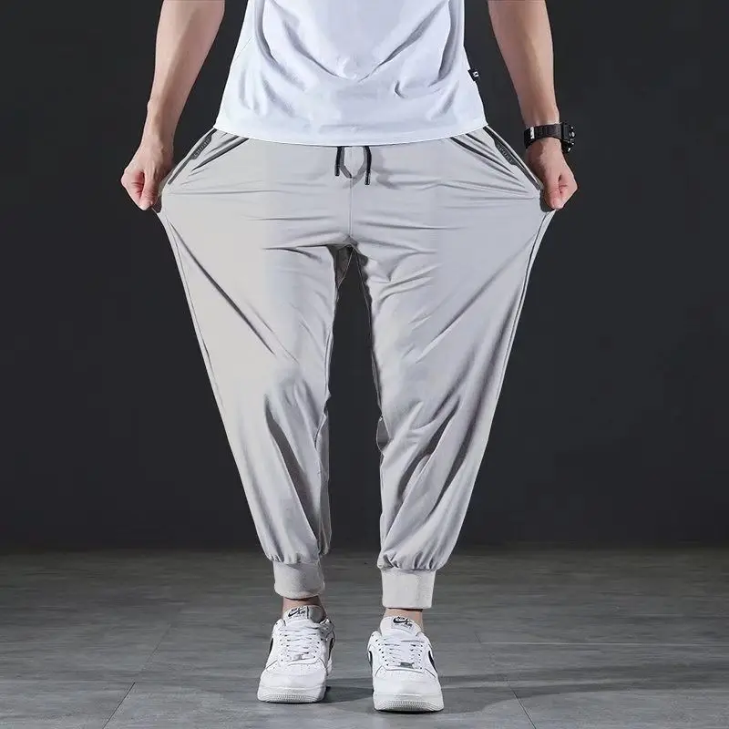 Summer Quick-drying Ice Silk Casual Pants Men\'s Ultra-thin Elastic Nine-point Pants Loose Drape Solid Beam Feet Pants 7XL