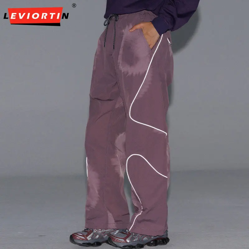 

Men's fashion trend anti splash quick drying sports ankle tied outdoor paratrooper pants irregular reflective splicing pants