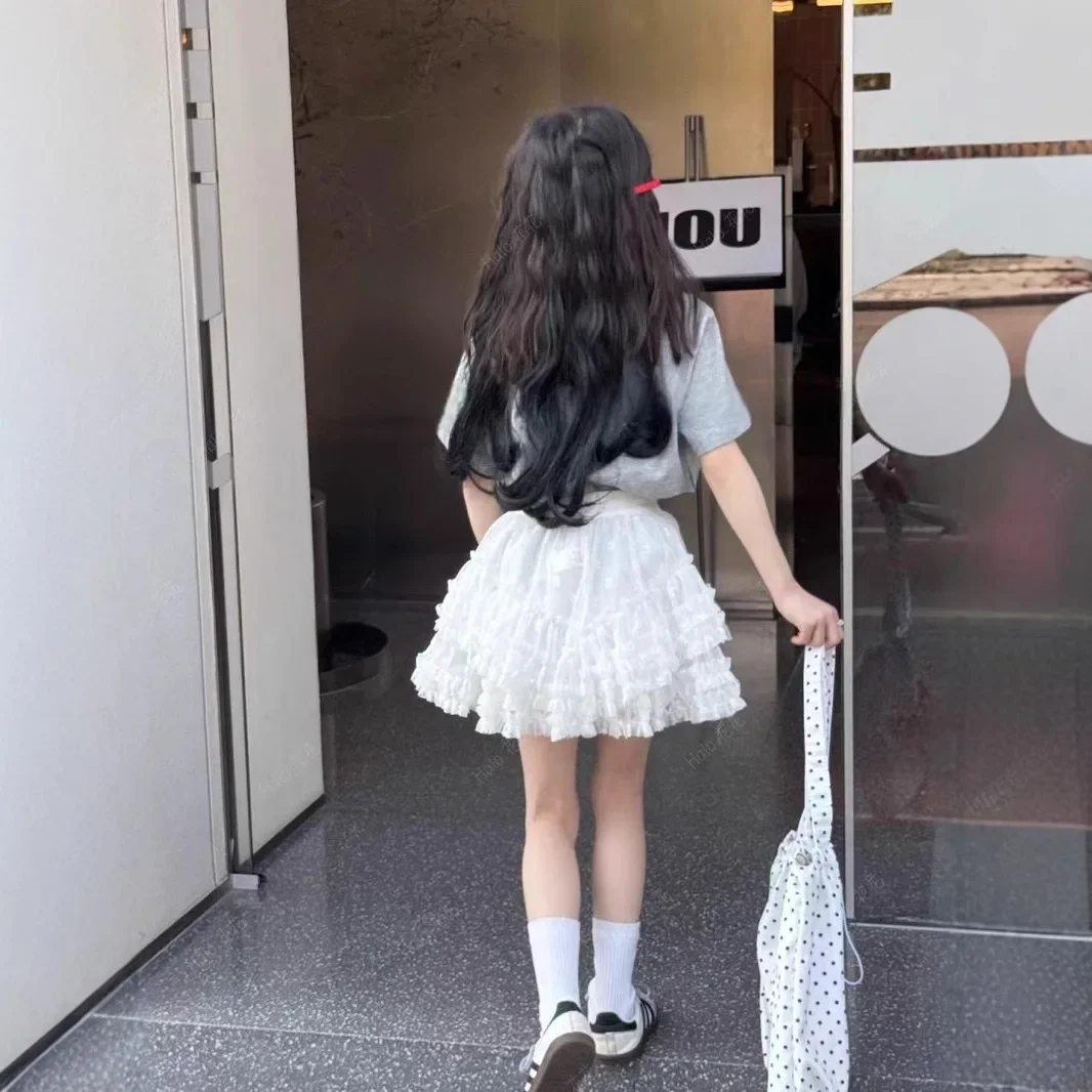 تنورة قصيرة شبكية كورية صيفية بلون سادة 2025 تنورة كعكة جديدة لطيفة ورائعة تناسب الجميع غير رسمية فضفاضة عالية الخصر