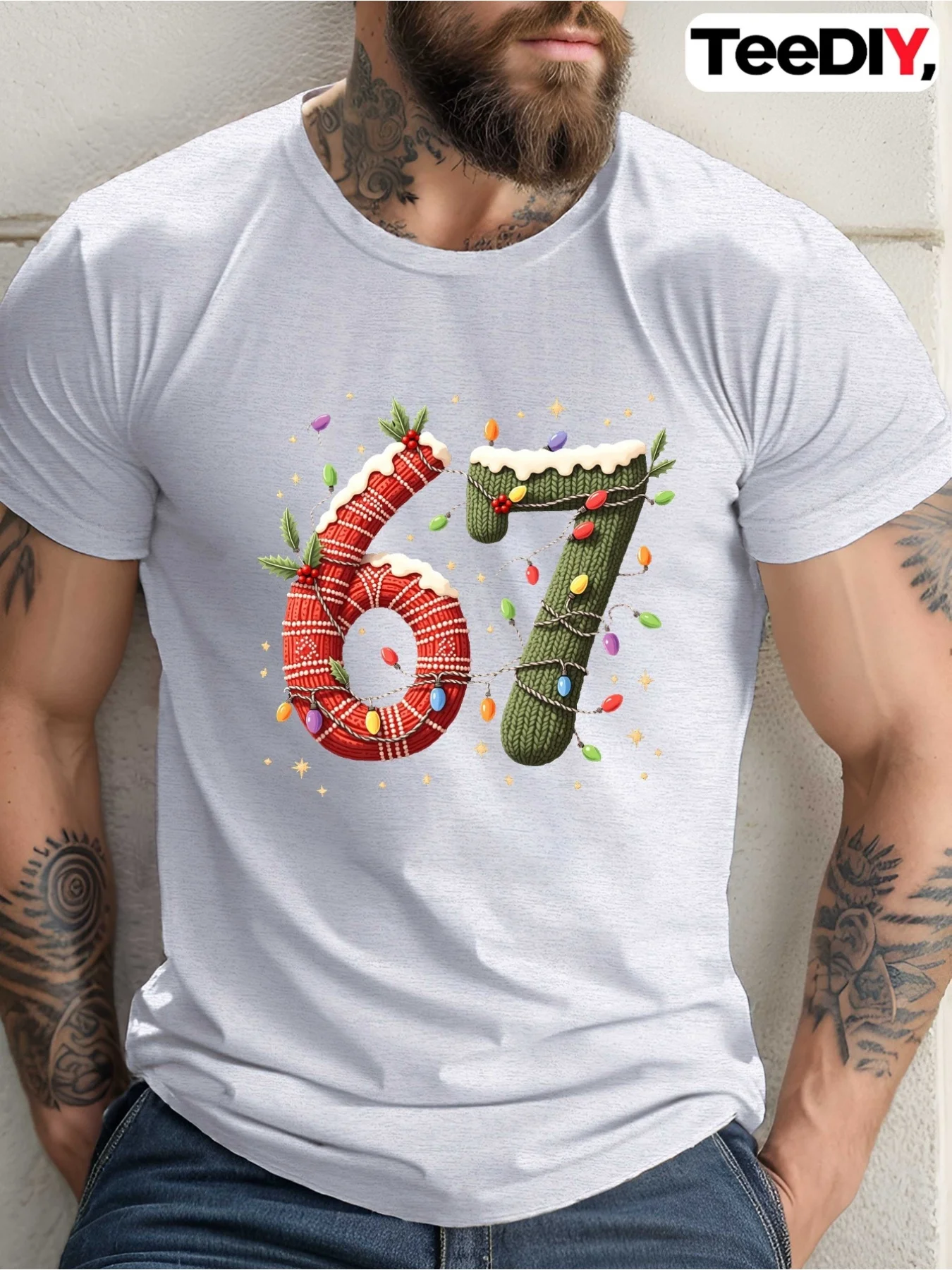 Cozy Holiday Themed T-Shirt For Men - Featuring Festive Ted Design Of Number 67 With Colorful Christmas Lights And Holly Leaves