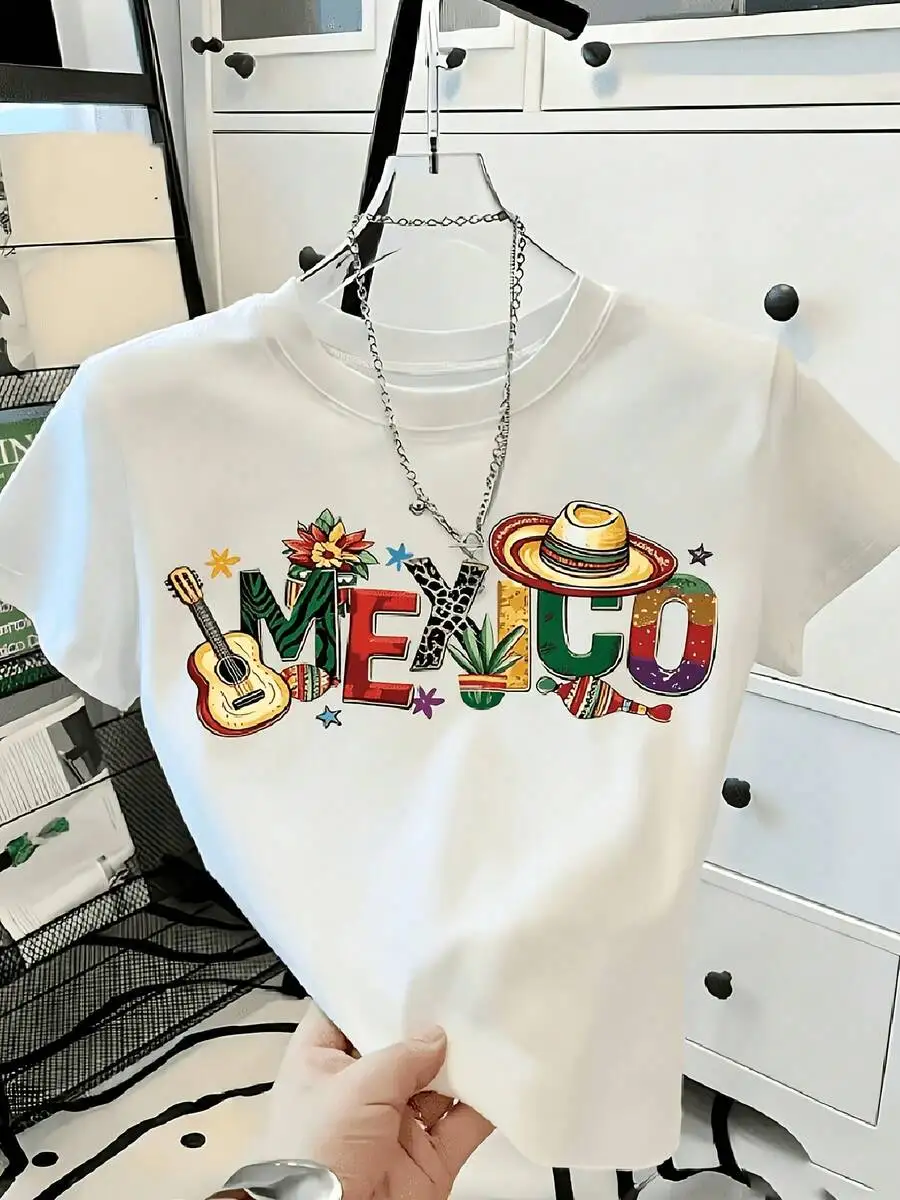 Loose Fit, Colorful Leopard Print Mixed With Mexican-Style Straw Hat, Guitar, And Cactus Lettering – A Women's White T-Shirt Perfect For Vacation