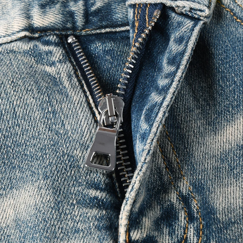 

High Street Fashion New Men's Jeans Perforated Patch Scratched Water Washed Nostalgic Elastic Slimming Light Blue Jeans High Str