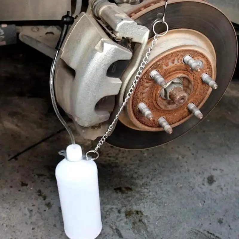 

Manual Brake Bleeder with 1L Brake Fluid Extractor and 60cm Hose Brake Oil Changing Tool Brake Fluid Bleeder