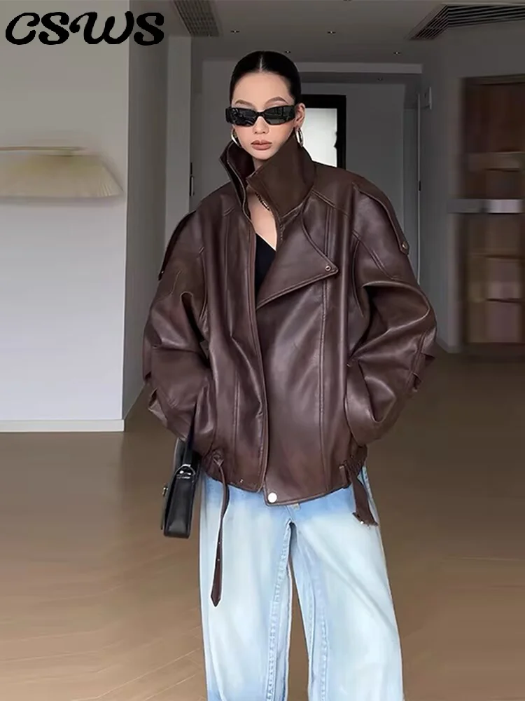 

Модная свободная куртка из искусственной кожи с поясом, женская однотонная куртка с длинными рукавами и лацканами на молнии и пуговицах, модная осенняя верхняя одежда 2025 года, женская верхняя одежда