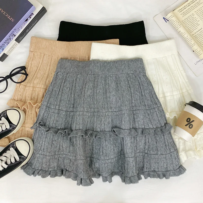 

Новая осенне-зимняя вязаная юбка в стиле ретро с высокой талией, А-силуэта, многоярусная, с мягким волнистым краем, утягивающая фигуру