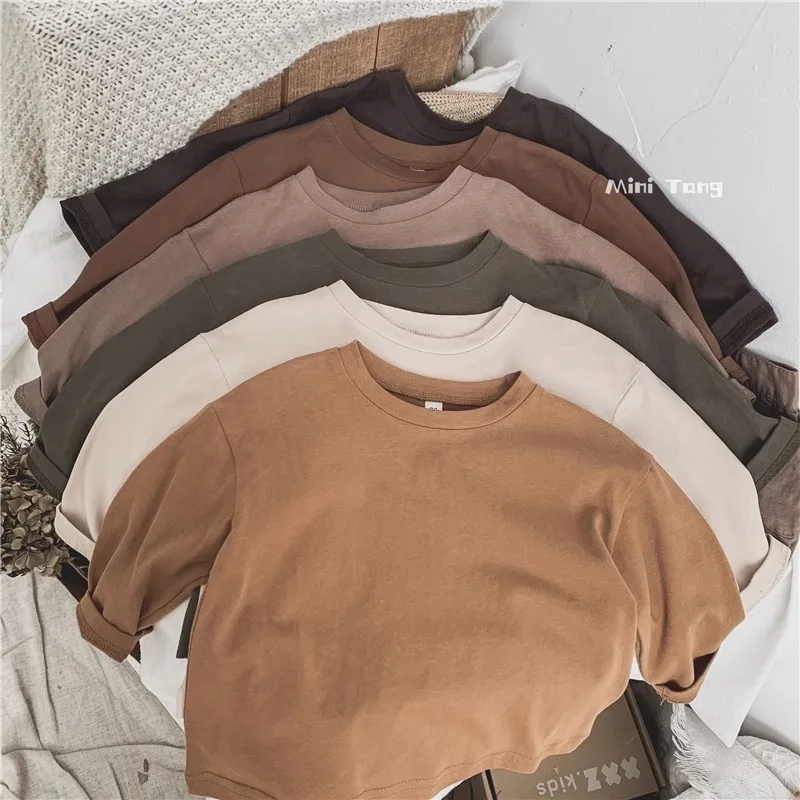 

2025 ins Autumn infant baby boys tops Round neck long sleeved toddler boys tops Solid colored loose kids baby boys T-shirt