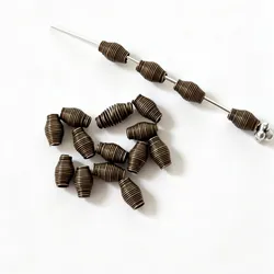 100pcs 8x4mm,hole:1.2mm antiqued bronze wire swirled design spacer beads h0422
