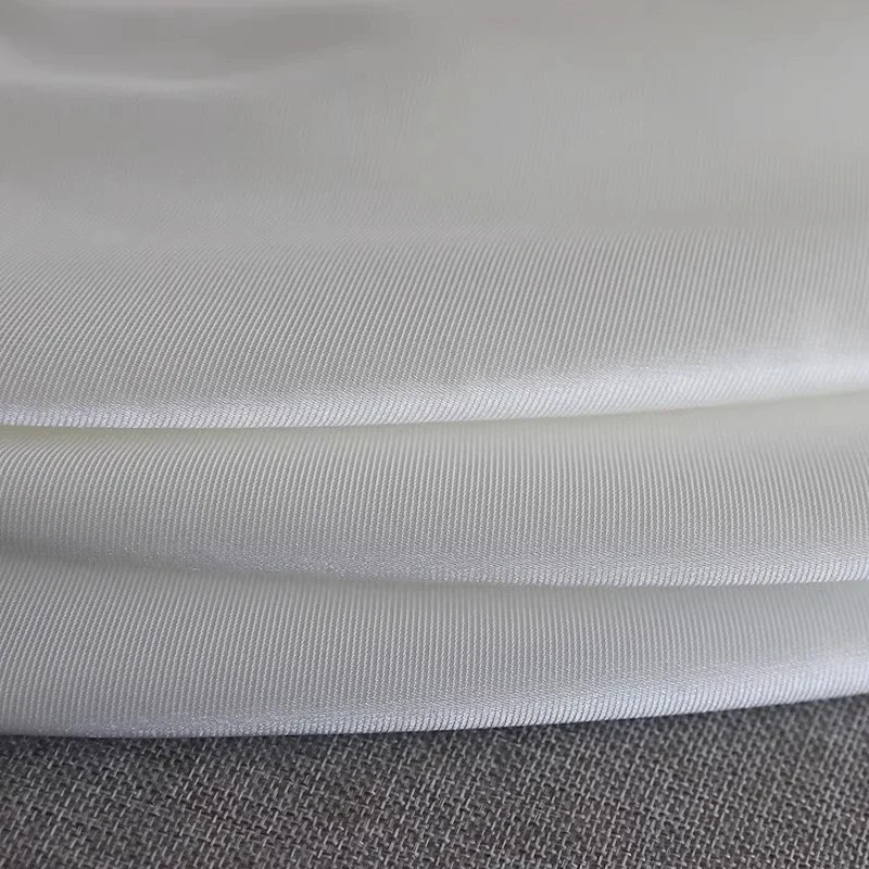 

Микадо атласный саржевый атлас слегка жесткая толстая ткань сшитое платье свадебное платье вечернее платье ткани «сделай сам» для шитья