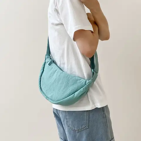 ठोस रंग नायलॉन महिलाओं के होबोस क्रॉसबॉडी बैग बड़ी क्षमता वाली महिला स्पोर्ट्स शोल्डर बैग कैज़ुअल लेडीज़ अंडरआर्म बैग हैंडबैग 10 best sales नायलॉन क्रॉसबॉडी बैग - №7