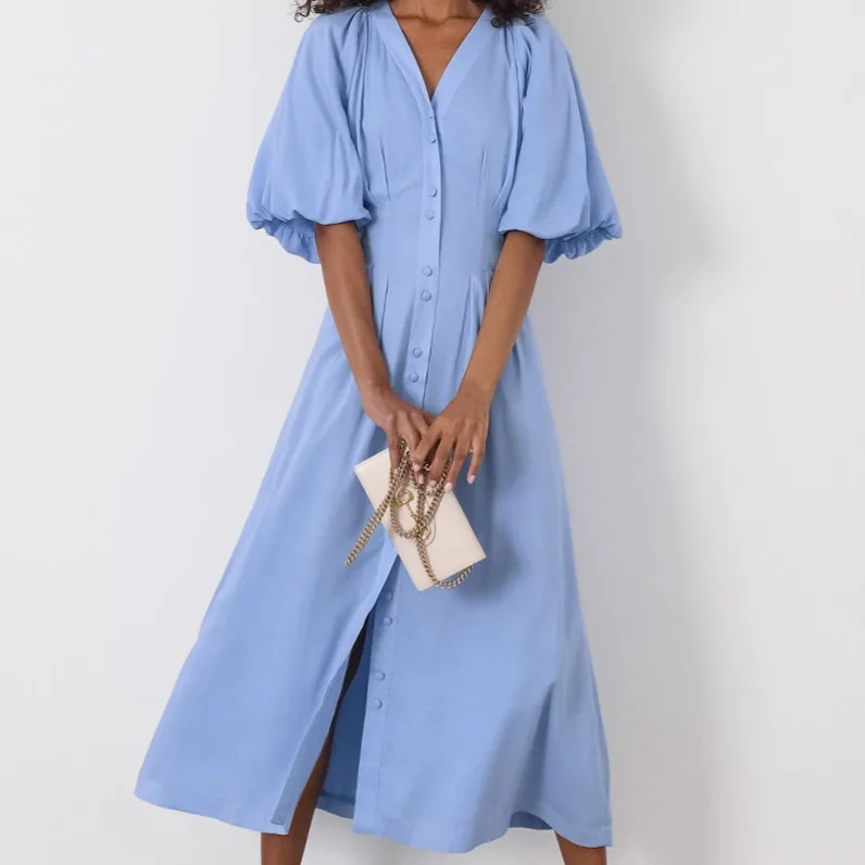 

French dress 2025 summer new style commuting A-line skirt pure cotton V-neck single breasted bubble sleeve niche skirt