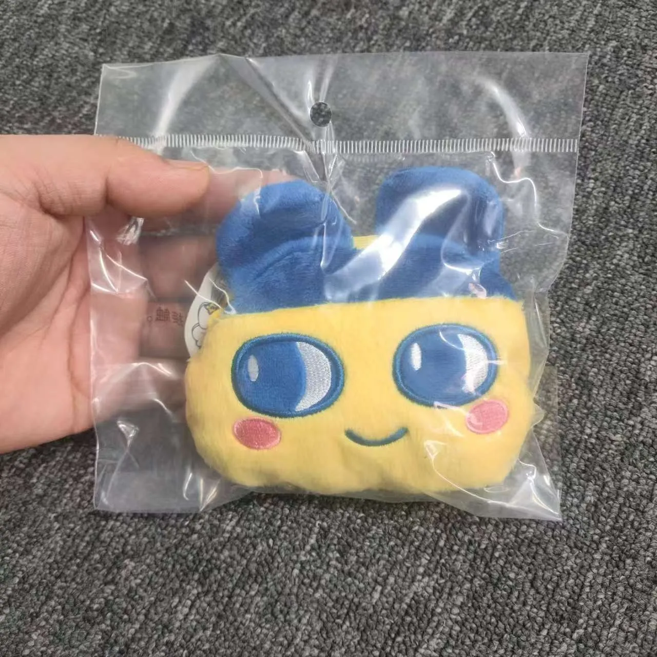 ของแท้จาก Bandai ทามาก็อตจิ โออุจิ โออมิมิ ตุ๊กตาขนนุ่มน่ารัก ของเล่นอิเล็กทรอนิกส์รูปแบบสัตว์เลี้ยง พร้อมกระเป๋าเก็บของแบบเครื่องเล่น  กระเป๋าใส่หูฟัง ของขวัญ