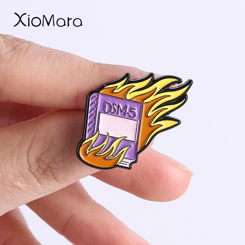 Burning DSM-5 Book …