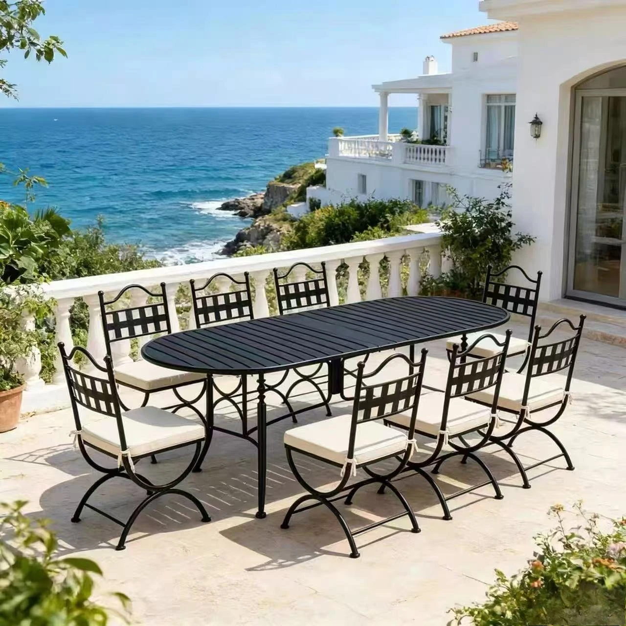 Villa courtyard, outdoor wrought iron dining table and chairs, bed and breakfast resort, open-air garden